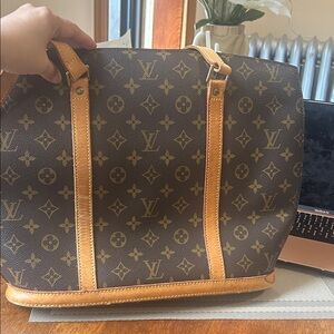 Authentic Louis Vuitton Brown Monogram Canvas Duffel with Tan Trim